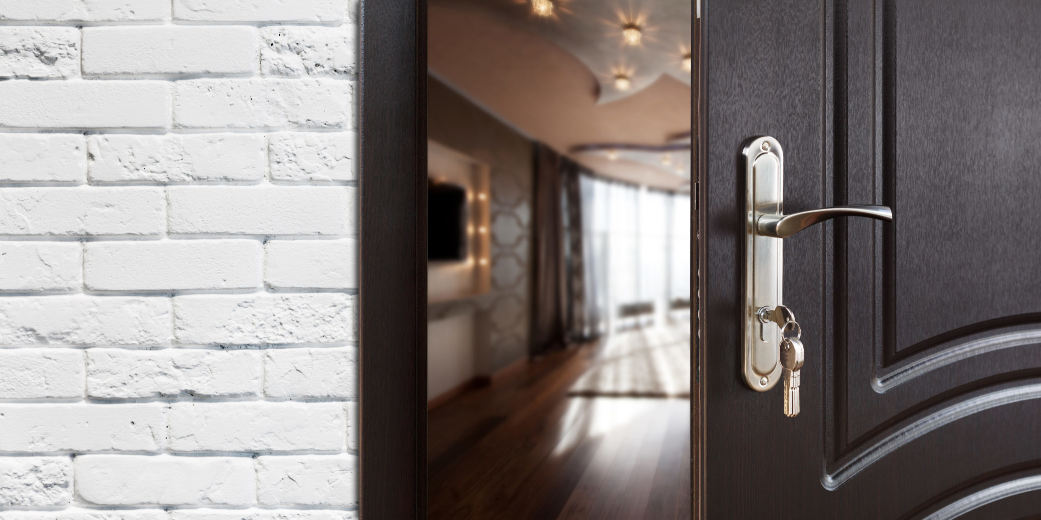 Half open door of a modern living room closeup.