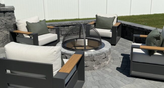 Grey paver with firepit and lights
